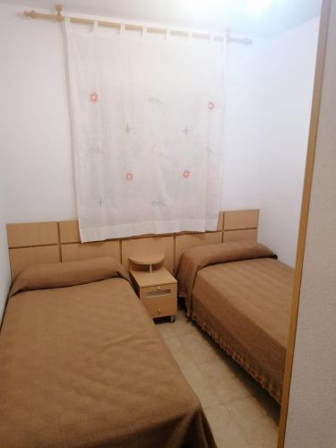 Cama o camas de una habitación en APCOSTAS Torremar - Oropesa