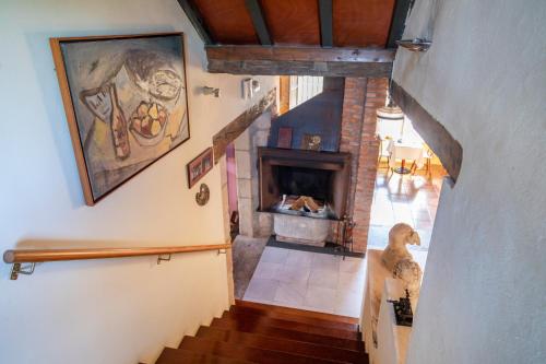 an overhead view of a living room with a fireplace at La Casona de Hermosa in Hermosa