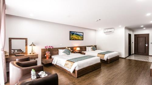 Ένα ή περισσότερα κρεβάτια σε δωμάτιο στο Liberty Lao Cai Hotel - Events