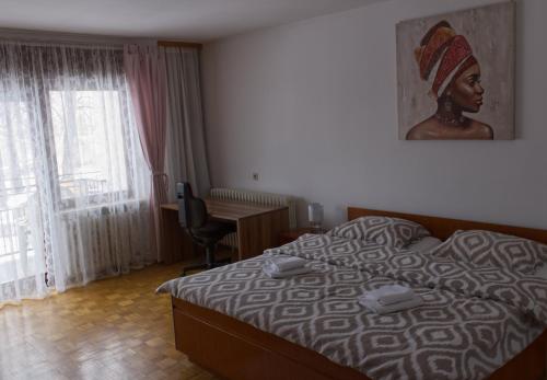 Postel nebo postele na pokoji v ubytování Gacka idila
