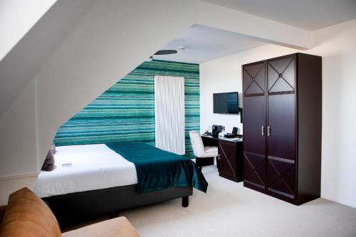 Postel nebo postele na pokoji v ubytování Hotel Amerika