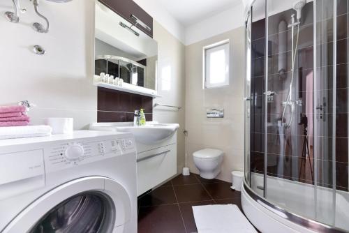 Kúpeľňa v ubytovaní Apartments Villa Visnjik