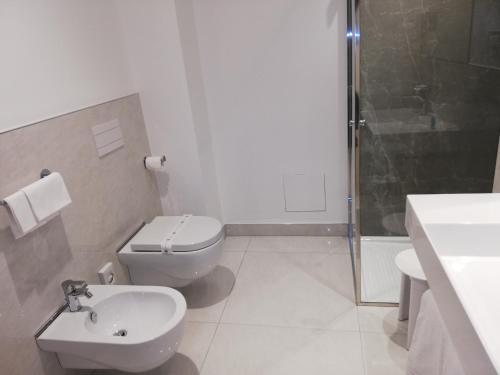 
Ein Badezimmer in der Unterkunft Novo Hotel Rossi
