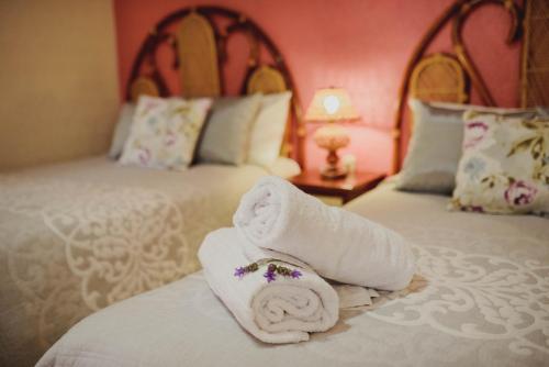 Postel nebo postele na pokoji v ubytování Gran Misiones Tequisquiapan