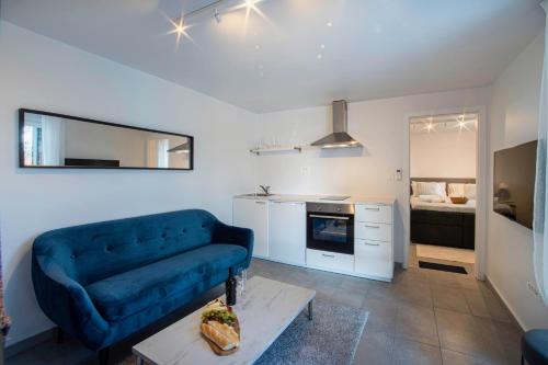 Kuchyňa alebo kuchynka v ubytovaní One Bedroom Apt with Garden views - Access to Amazing Rooftop Terrace, Free Parking and Gym on premises