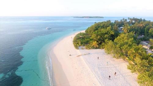 an aerial view of a beach with people on it at PERLA Dhangethi in Dhangethi