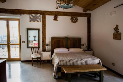 Ένα ή περισσότερα κρεβάτια σε δωμάτιο στο B&B Il Cavallino