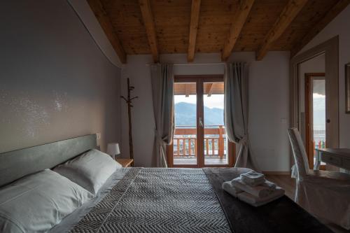 Ένα ή περισσότερα κρεβάτια σε δωμάτιο στο Alla Vecchia Contrada B&B