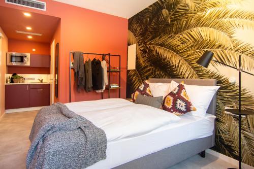 Ένα ή περισσότερα κρεβάτια σε δωμάτιο στο Astoria Apartments