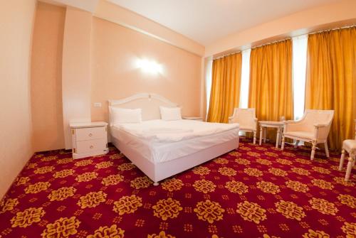 Postel nebo postele na pokoji v ubytování Complex Aristrocratos