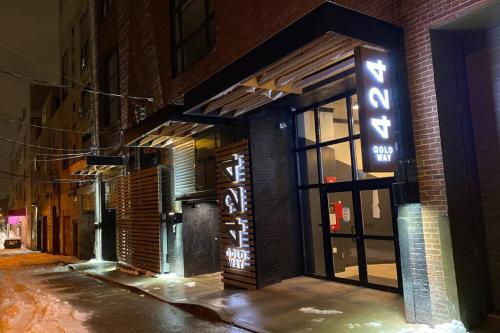 a building with a sign on the side of it at 3E-Spacious 2 bedroom in Oakland, sleeps 8 in Pittsburgh