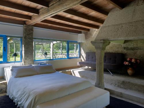 Postel nebo postele na pokoji v ubytování A Cabana de Carmen