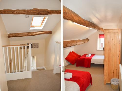 a bedroom with two beds and a staircase in a attic at Heathylee in Longnor