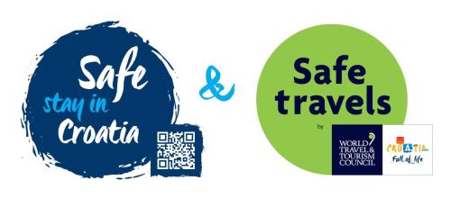 two stickers with the text safe travels and stay in croatia and world travel at Apartment Capo Residence - Old Town - Parking in Trogir