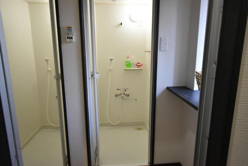Ett badrum på Guest House Shizuho