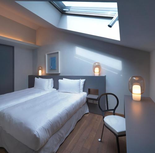 Cama ou camas em um quarto em Posta Design Hotel