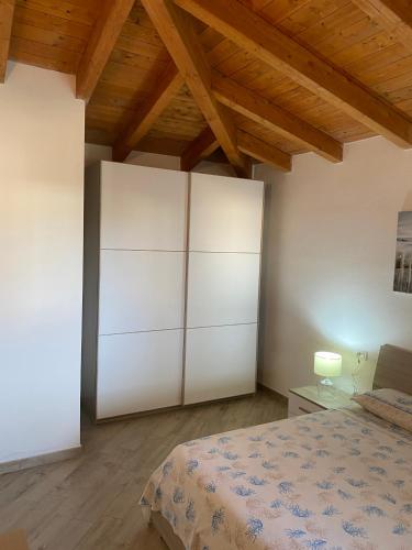 Cama o camas de una habitación en Residenza Limpiddu