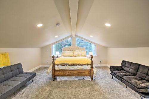a bedroom with a bed and a couch at Peaceful Fall Escape Oregon Home with Ocean View in Yachats