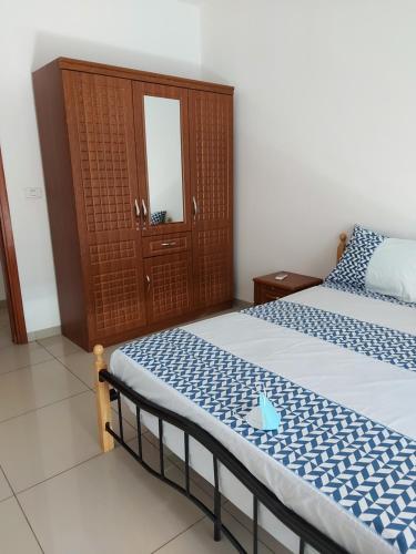 Giường trong phòng chung tại Un appartement de Standing sur la VDN