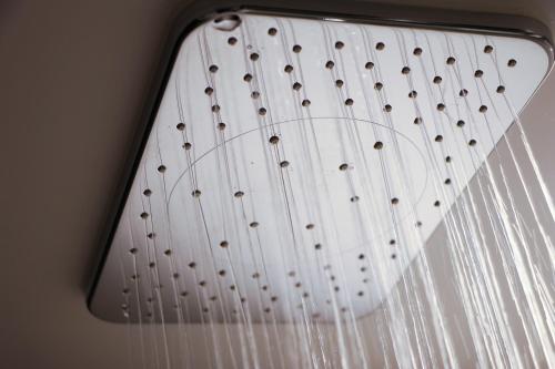 a white metal ceiling with rivets on it at Hotel The M's Kyoto in Kyoto