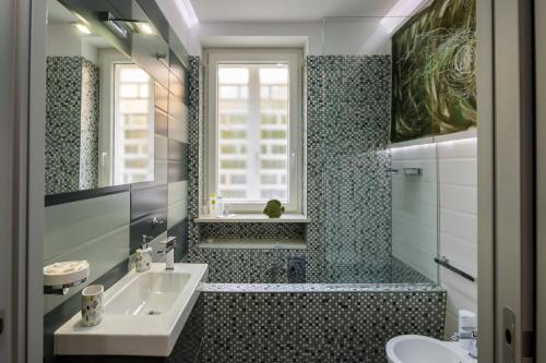 Ένα μπάνιο στο Villa Capri Apartment and Room
