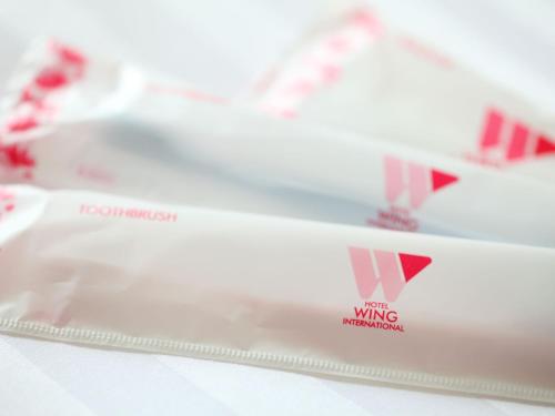 a close up of a white box with a nursing instrument at Hotel Wing International Nagoya in Nagoya
