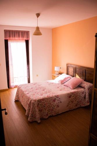 Ένα ή περισσότερα κρεβάτια σε δωμάτιο στο Casa Valdequiruelo