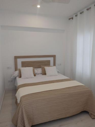Ένα ή περισσότερα κρεβάτια σε δωμάτιο στο BonaMar I - 2A
