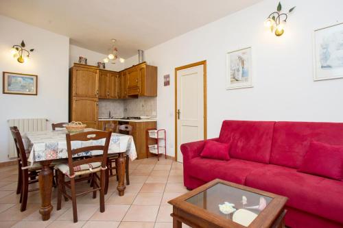 Kuchyň nebo kuchyňský kout v ubytování Appartamento in Via del Mare a Procchio