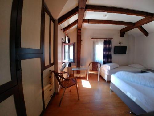 Konak Hotel Tuzlaにあるベッド