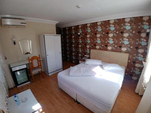 Konak Hotel Tuzlaにあるベッド