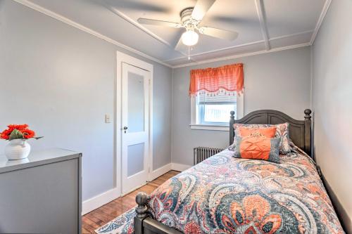 a bedroom with a bed and a ceiling fan at Newport House Less Than 3 Mi to Beaches and Bowens Wharf! in Newport