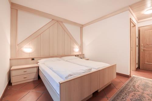 Postel nebo postele na pokoji v ubytování Hotel Foresta
