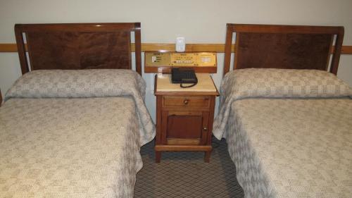 En eller flere senge i et værelse på Gran Hotel Libertad