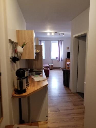 Una cocina o cocineta en Altstadt Ferienwohnung Stralsund mit Parkplatz