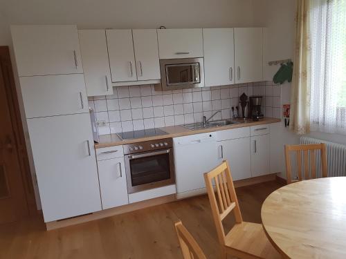 Dapur atau dapur kecil di Apartments Spiegl Holzmann