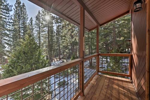 a deck with a view of the woods at Less Than 1 Mi to Beach Expansive Tahoe Escape with Hot Tub in Incline Village