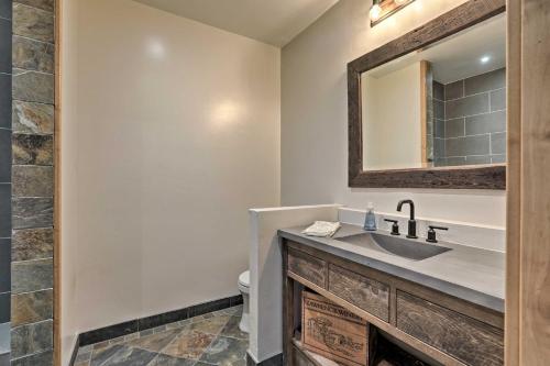 a bathroom with a sink and a mirror at Less Than 1 Mi to Beach Expansive Tahoe Escape with Hot Tub in Incline Village