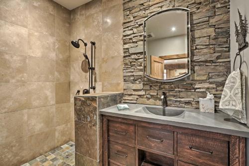 a bathroom with a sink and a mirror at Less Than 1 Mi to Beach Expansive Tahoe Escape with Hot Tub in Incline Village