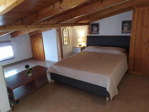 מיטה או מיטות בחדר ב-Ideal Family House