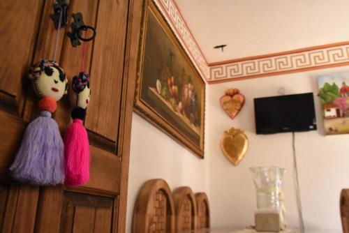 HOTEL CASA LIMONにあるテレビまたはエンターテインメントセンター