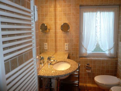 Ванна кімната в Hues-Loerki-App-2