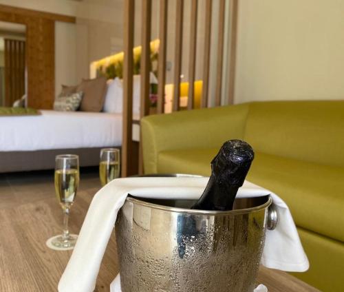a bottle of wine sitting on top of a table at Dreams Onyx Resort & Spa - All Inclusive in Punta Cana
