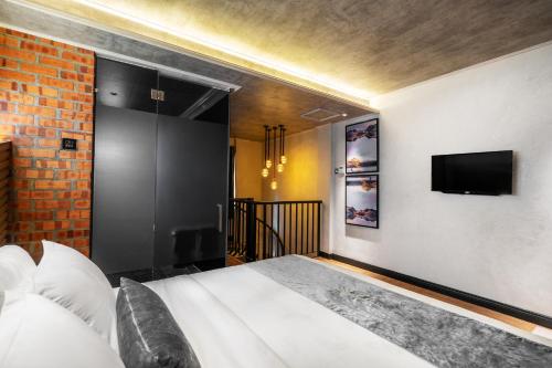 A&R Urban Hotelにあるベッド