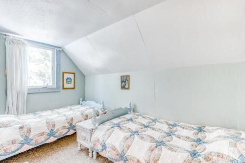 Säng eller sängar i ett rum på The Wilcox Cabin