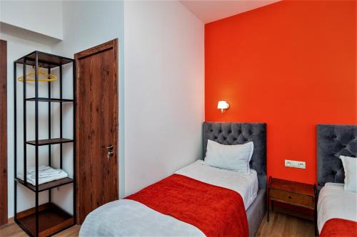Una cama o camas en una habitación de B&B Old Tbilisi