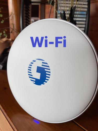 a wfir sign on top of a table at Lala Mountain Homestay‧Cile Farm in Hualing