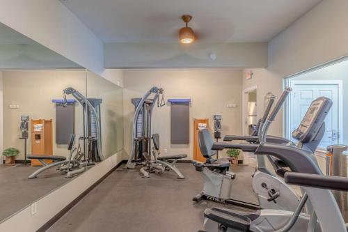 a gym with a row of treadmills at Best Western Inn at Face Rock in Bandon