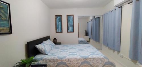 Säng eller sängar i ett rum på Mar Bonita Beach Appartment II