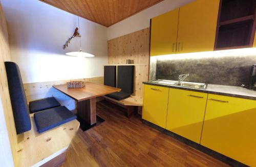 Kuchyň nebo kuchyňský kout v ubytování Appartements Grumserhof